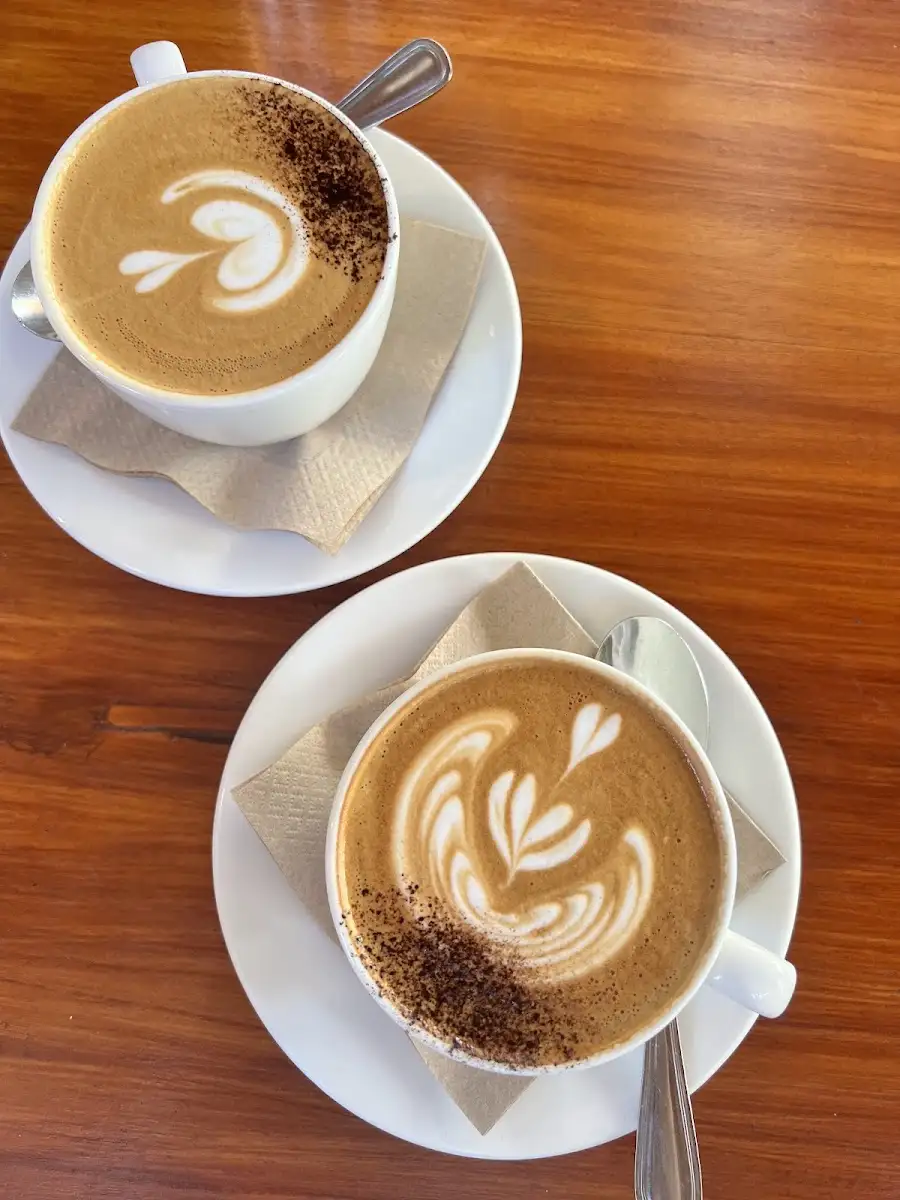 Two coffees with latte art at BRAUD Cafe in Uluwatu