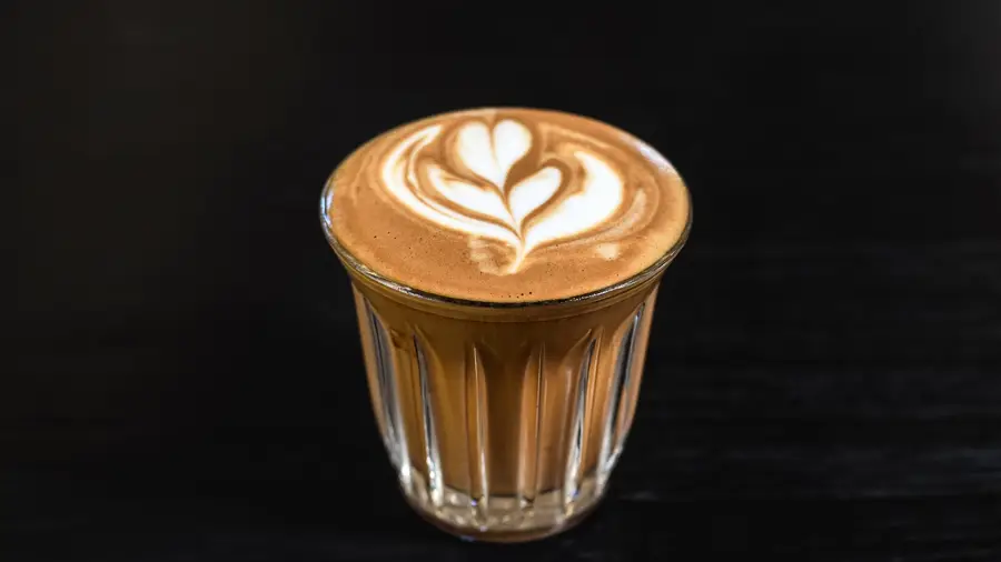 A small coffee with latte art at UM Brunch & Specialty Coffee in Uluwatu